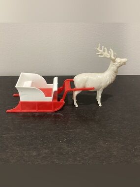 Vtg. 1940s-1950s early plastic Christmas decoration sleigh with a Reindeer